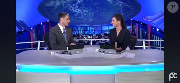 Patrícia Poeta e William Bonner no estúdio do Jornal Nacional em 2014, na noite em que a jornalista anunciou sua saída do telejornal