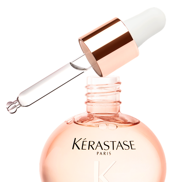 O Glaze Drops Gloss Absolu, óleo leve com rosas selvagens, garantiu menos frizz e fios mais macios ao cabelo de Bruna Marquezine no Oscar 2026.