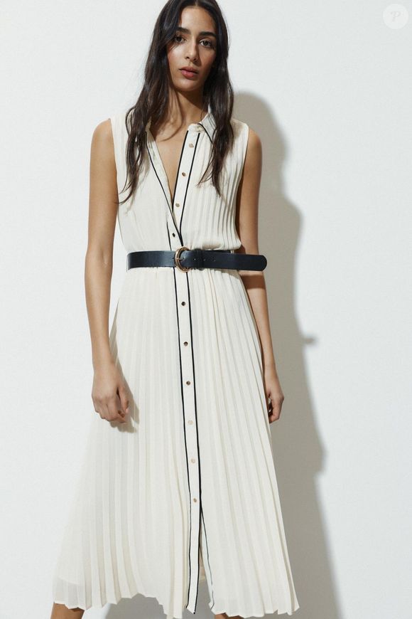 Enquanto Carolina Herrera apostou no branco com dourado, a Zara moderniza o visual com detalhes em preto