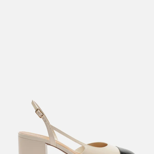 Com estética retrô e acabamento sofisticado, o slingback bicolor da Arezzo surge como opção elegante para quem quer investir em um clássico atemporal