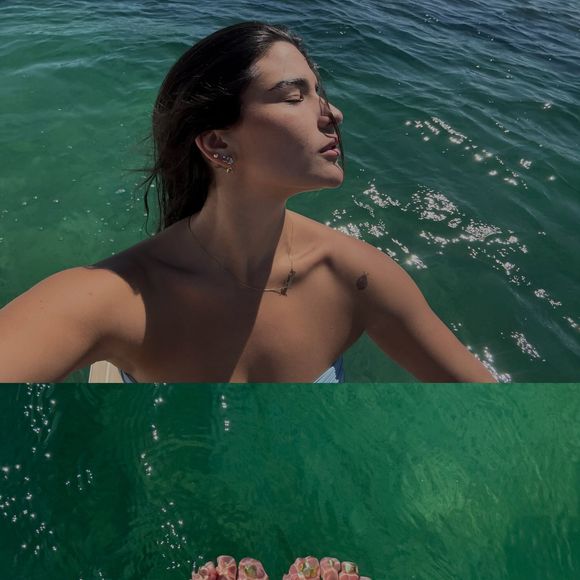 Giulia Costa mergulhou em um dos famosos lagos suíços e dividiu os registros da viagem nas redes sociais