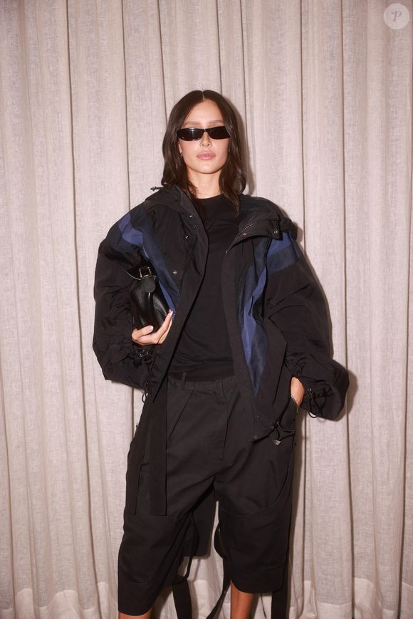 Em outro look, Livia Marques elege jaqueta bomber de R$ 17.860,80 em festa da NK Store com a grife The Attico em São Paulo