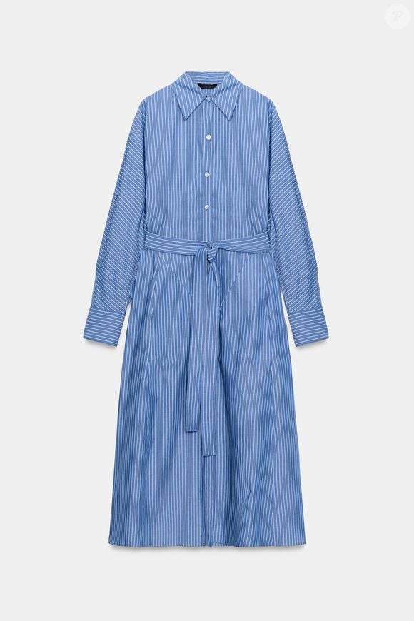 A camisa vestido listrada da Zara prova que uma única peça pode resolver todo o look de inverno. O modelo da ZW Collection entrou na liquidação com 30% de desconto e passou de R$ 529 para R$ 370,30