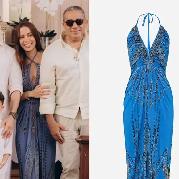 Usando vestido de malha franzido com decote em V por Camilla Franks, custando aproximadamente R$ 3.400.