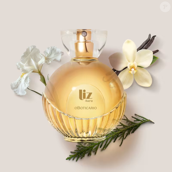 A fragrância Liz Aura de O Boticário mistura a feminilidade envolvente da baunilha com a força das madeiras, além de trazer o precioso óleo da íris francesa, extraído após seis anos de maturação subterrânea
