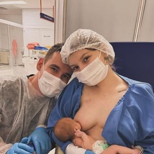 Isabel Veloso em foto com o filho, Arthur, e o marido, Lucas Borba