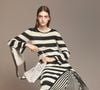 As listras continuam entre as estampas que prometem ganhar espaço na Primavera 2026, e este vestido da Zara aposta em uma interpretação mais sofisticada da tendência. A peça tem gola redonda, mangas amplas e barra evasê com listras em contraste. O modelo custa R$ 529