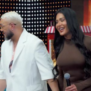 Belo e Gracyanne Barbosa ficaram de mãos dadas durante a gravação do programa