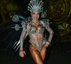Tati Minerato escolheu uma fantasia semelhante à de Mariana Goldfarb, mas na cor prata