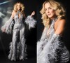 Icônica! Prestes a completar 50 anos, Ticiane Pinheiro incorpora diva disco inspirada em Cher com brilho e plumas em festa luxuosa; veja fotos