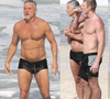 Genética boa! Aos 63 anos, Marcello Novaes exibe abdômen definido de sunga cavada em praia com o filho Pedro Novaes; fotos