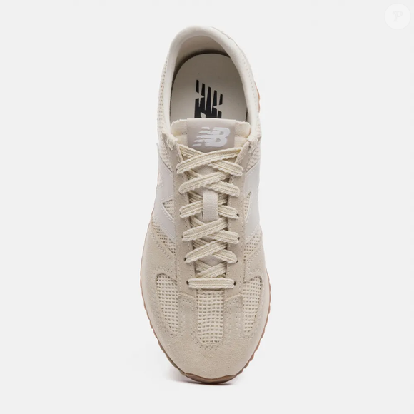 O New Balance 471 chega ao Brasil por R$ 549,99 apostando em um visual vintage que combina com looks casuais, de escritório e até produções esportivas