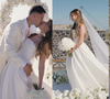 Vestido de noiva princesa tomara que caia, véu longo e buquê branco: Isabella Rousso se casa com Gabriel Martinelli em cerimônia intimista para 40 convidados em Santorini; fotos