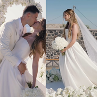 Vestido de noiva princesa tomara que caia, véu longo e buquê branco: Isabella Rousso se casa com Gabriel Martinelli em cerimônia intimista para 40 convidados em Santorini; fotos