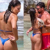 Gata, bronzeada e cheia de amor! De biquíni fio-dental, Juliana Paes dá 'beijo de cinema' no marido em Noronha; corpo definido rouba cena. Fotos