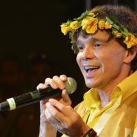 Internado com câncer, Netinho rejeita motivo político para ignorar número 13 em post '12+1'; cantor rebate internauta: 'Escrevo como quero'