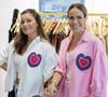 Fernanda Pontes, da If You Foundation ao lado de Jana Fleck, diretora criativa da Ora Resort vestem a camisa Cora.