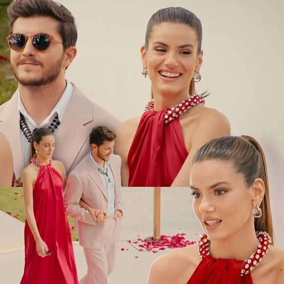 Camila Queiroz surge com vestido longo e fluido na cor vermelha em um dos episódios