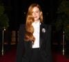 Para combinar com o terno preto, Marina Ruy Barbosa escolheu uma calça também preta de cintura alta